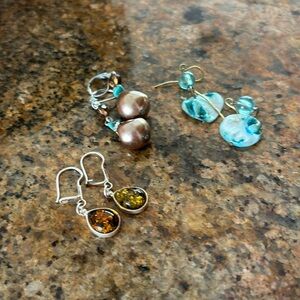 Three pair of earrings